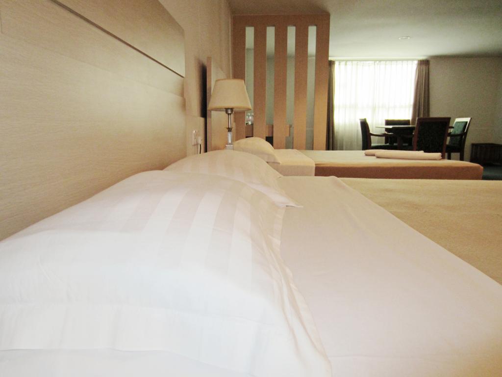 Promenade Service Apartment Кота-Кінабалу Номер фото